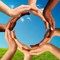 Multiracial Hands Making a Circle Together