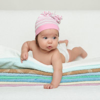 one happy baby on towel
